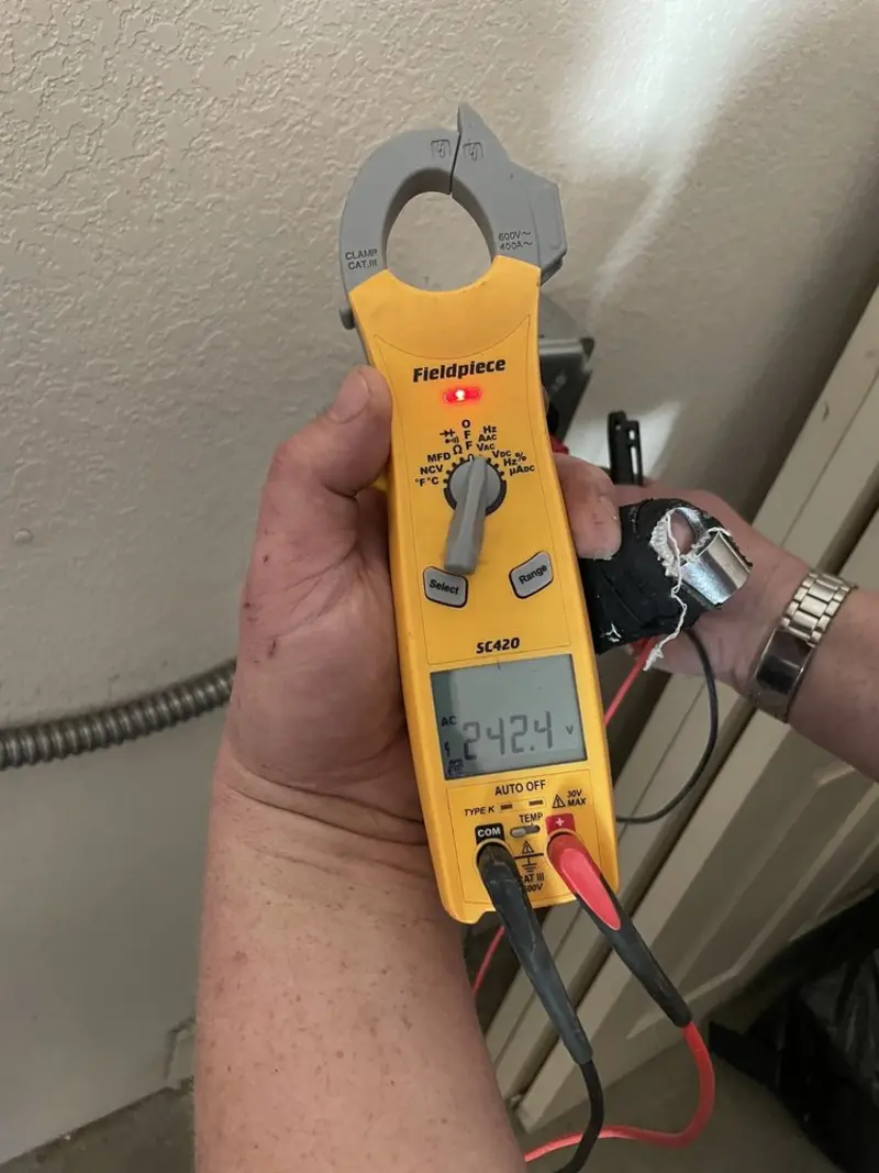 Voltage testing with clamp meter during Generator Installation in Jacksonville